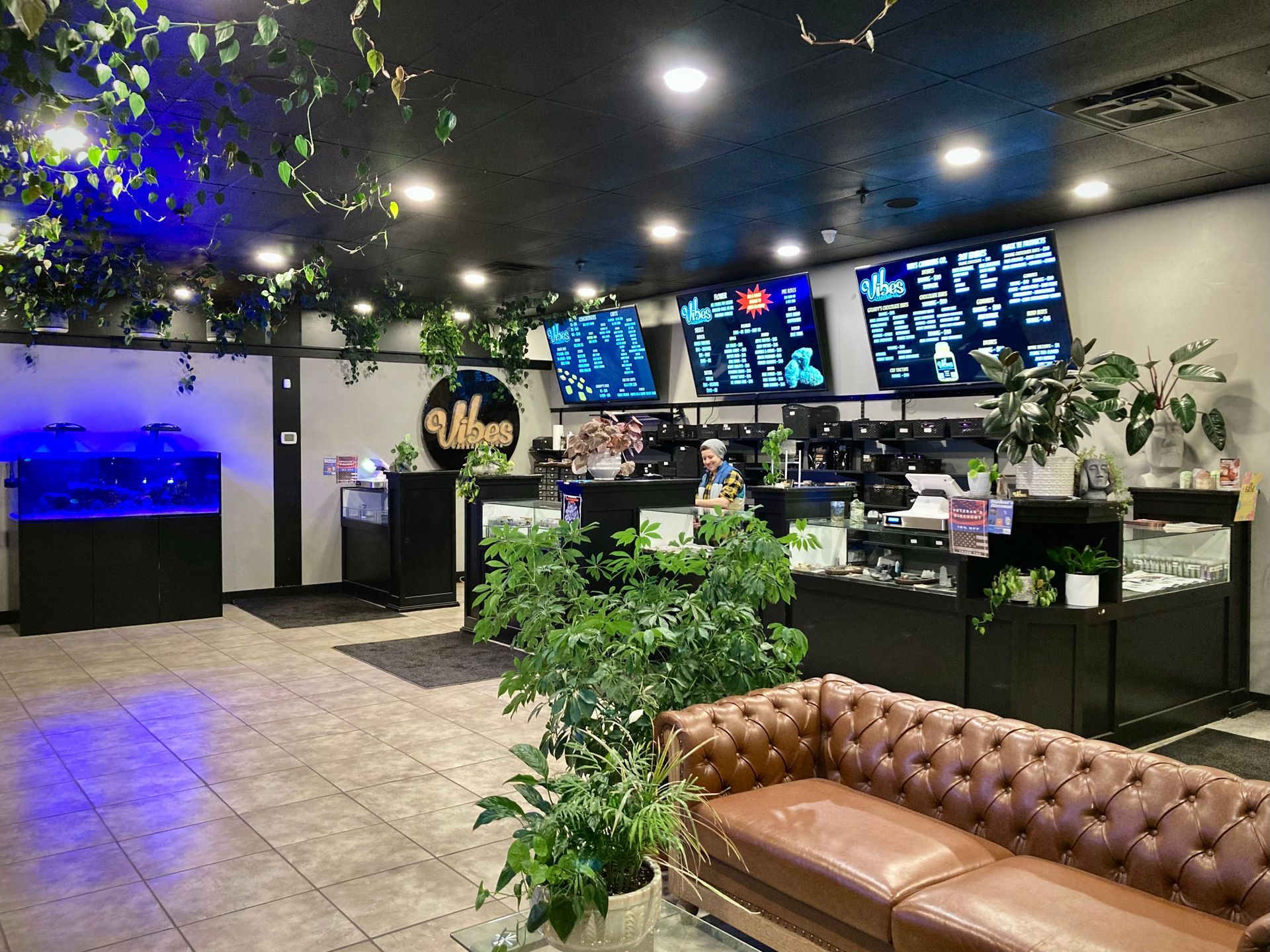 Service counter and digital menu boards at Vibes Cannabis Co in Bangor, Maine